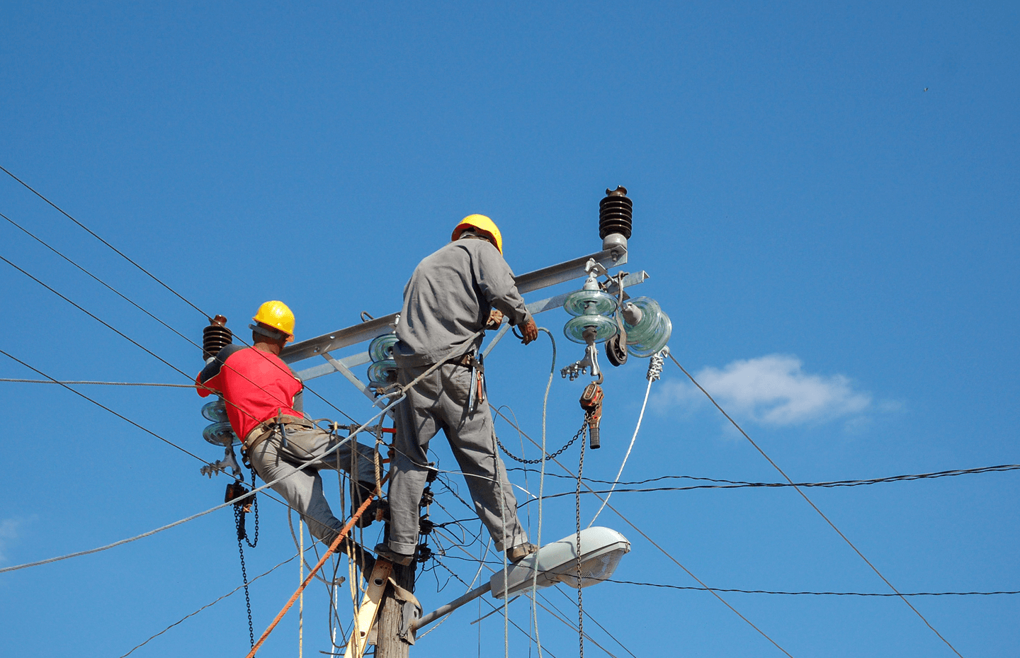 Electrical transmission tower against gradient sky