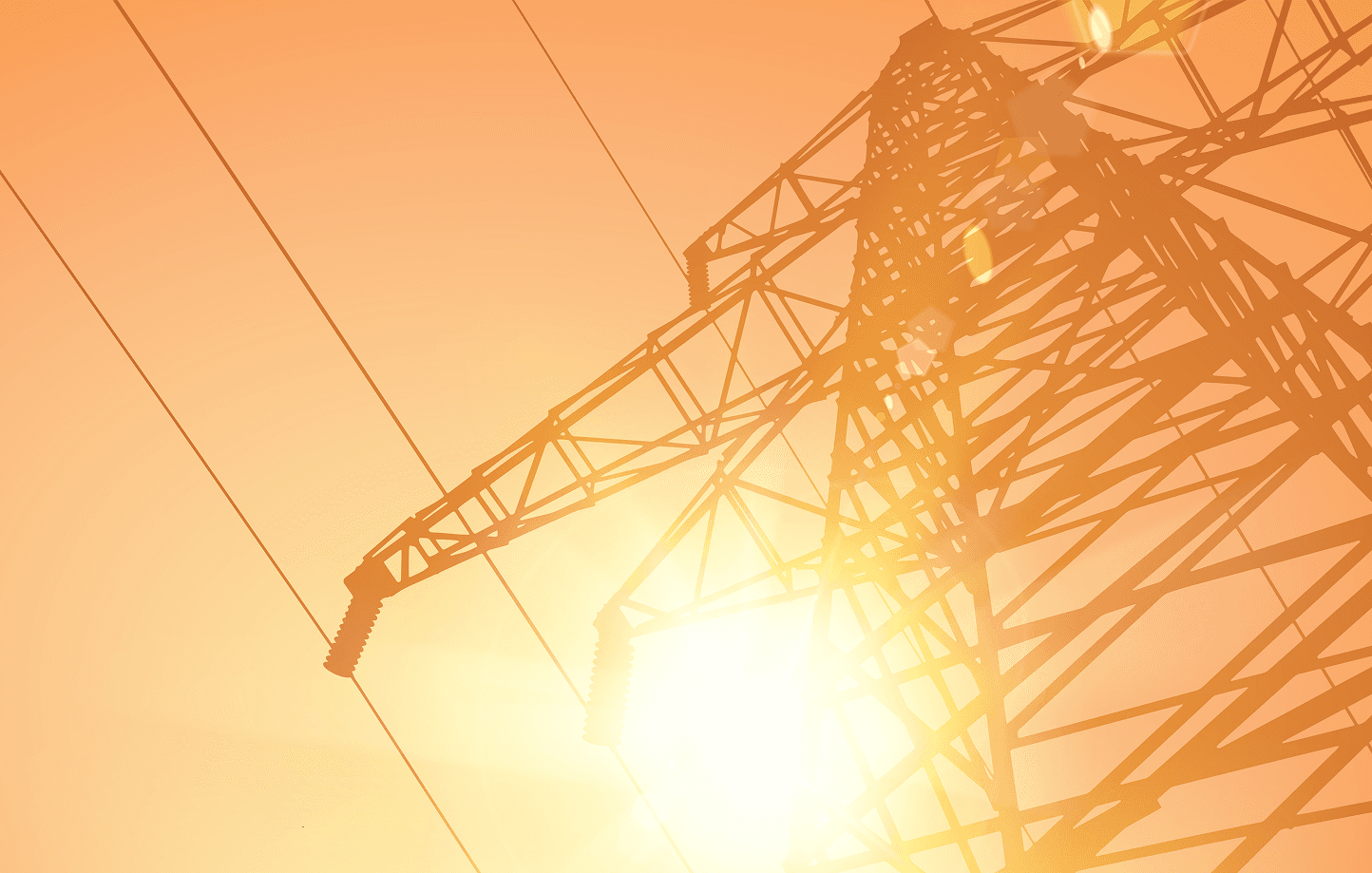 Electrical transmission tower against gradient sky